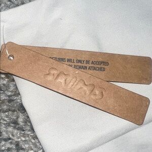 SKIMS Soft Smoothing Seamless Leggings in the color STONE